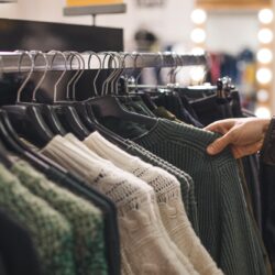 Retail shopping, clothes on hangers